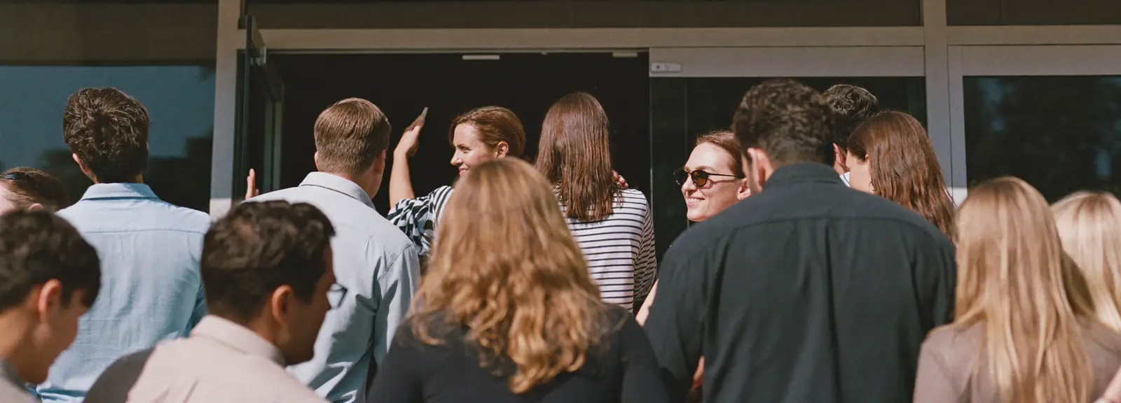 A queue of customers enters a restaurant on its opening morning